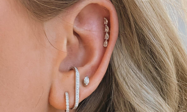 baan Oceaan Meander Culet earparty. Witgouden oorbellen met diamant. | juwelier & goudsmid  Nottet