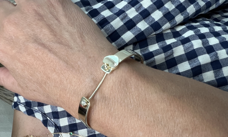 Gouden armband met as verwerking